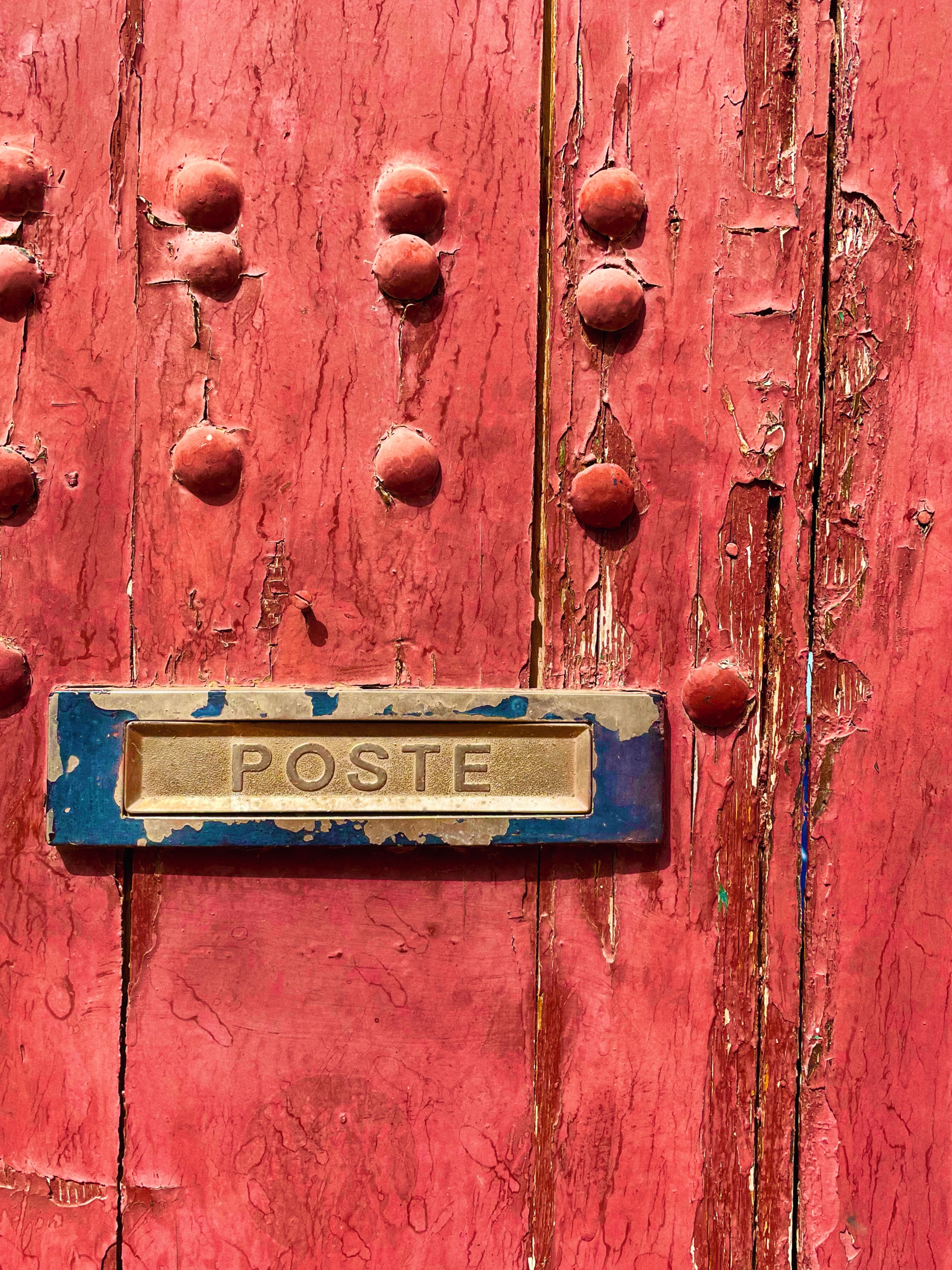 Red door with post box