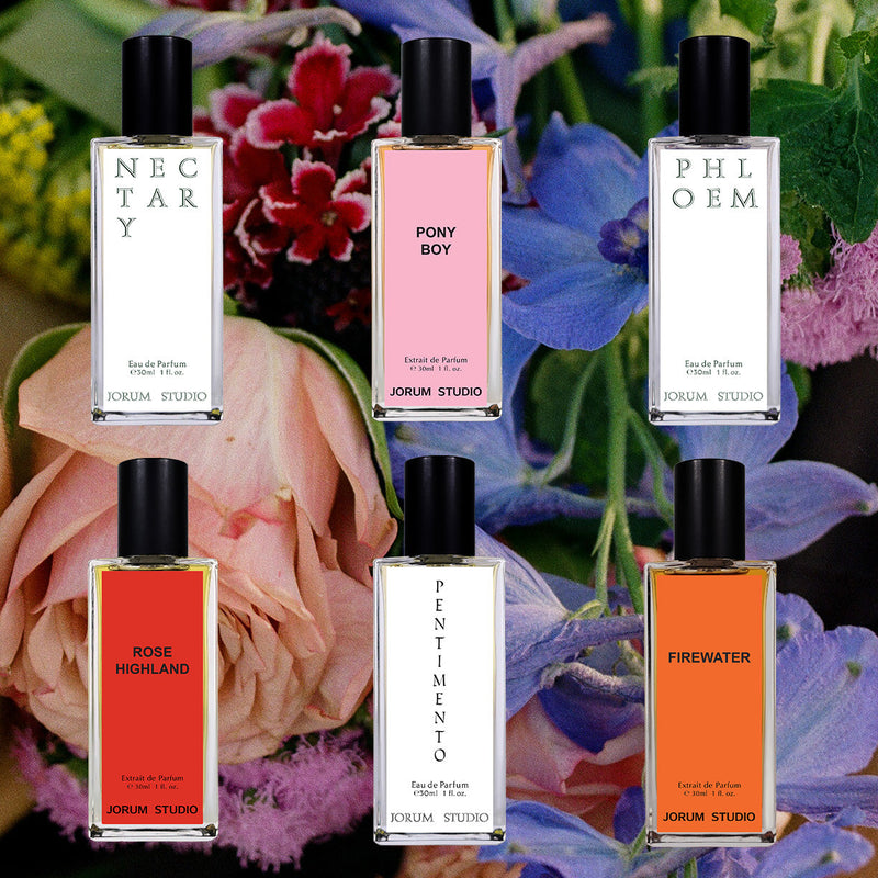 Six Jorum Studio fragrance bottles superimposed over a floral photograph