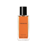 30ml bottle of Firewater Extrait de Parfum by independent Scottish perfumers Jorum Studio, the bottle has an orange label